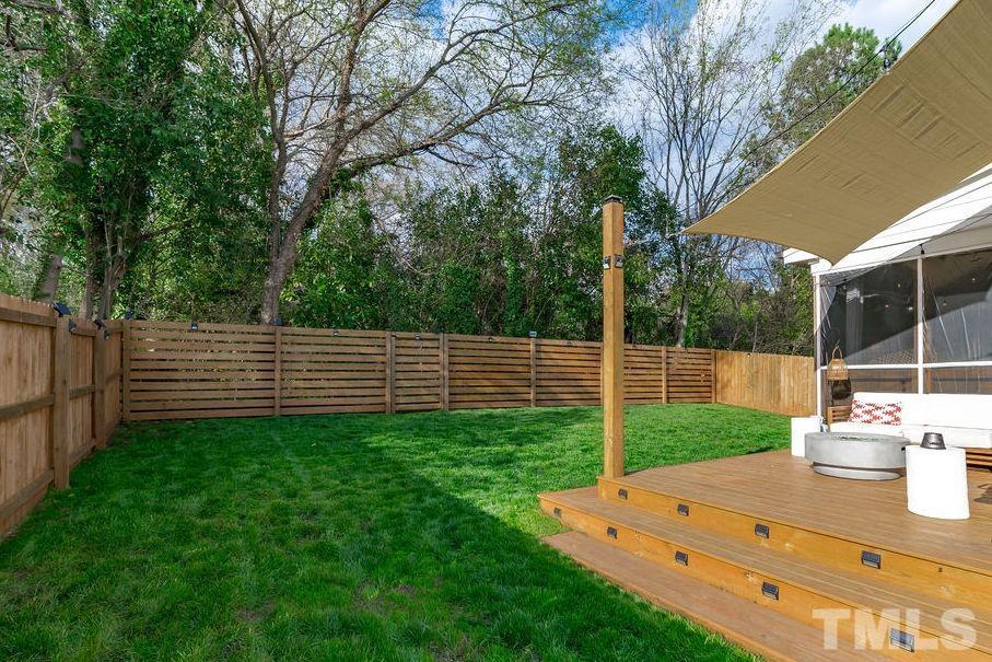 607 Bragg Street Raleigh, NC 27610 - Photo 34 of 44 a view of a chair and table in the garden