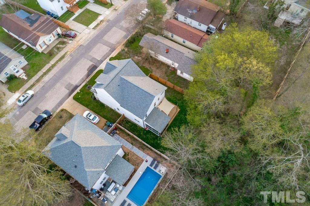607 Bragg Street Raleigh, NC 27610 - Photo 42 of 44 an aerial view of house with yard
