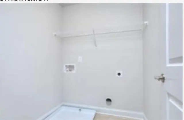 a kitchen with a sink and a large window