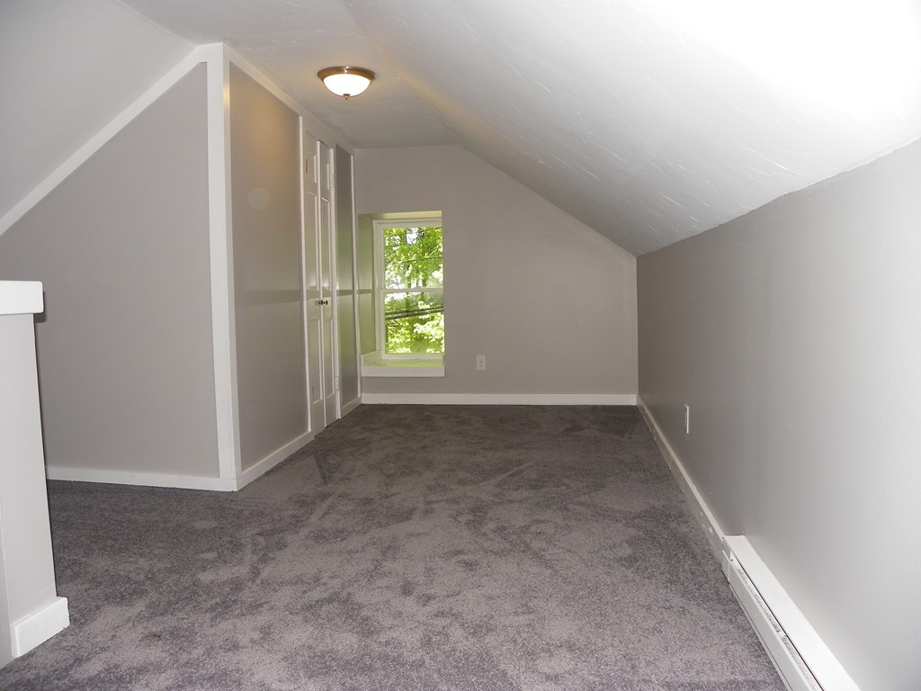 4 Gardner Road Hubbardston, MA 01452 - Photo 12 of 22 an empty room with windows and closet