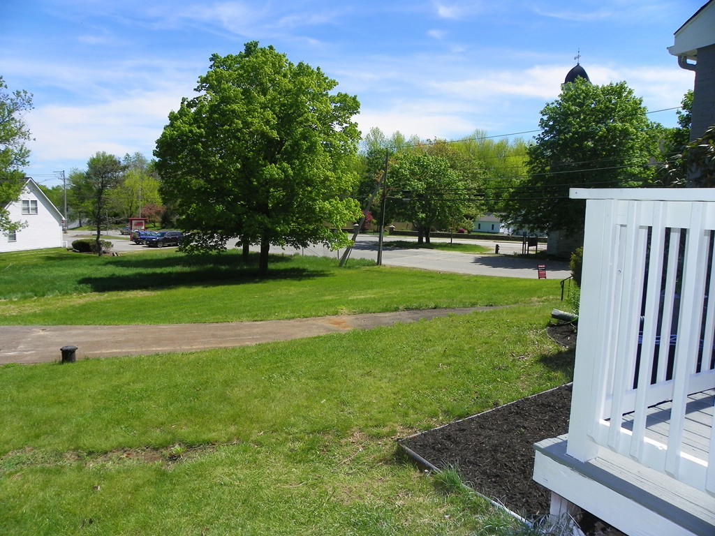 4 Gardner Road Hubbardston, MA 01452 - Photo 16 of 22 a view of a backyard with sitting area