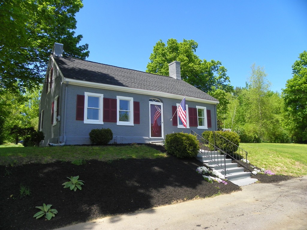 4 Gardner Road Hubbardston, MA 01452 - Photo 2 of 22 a view of a brick house with a yard