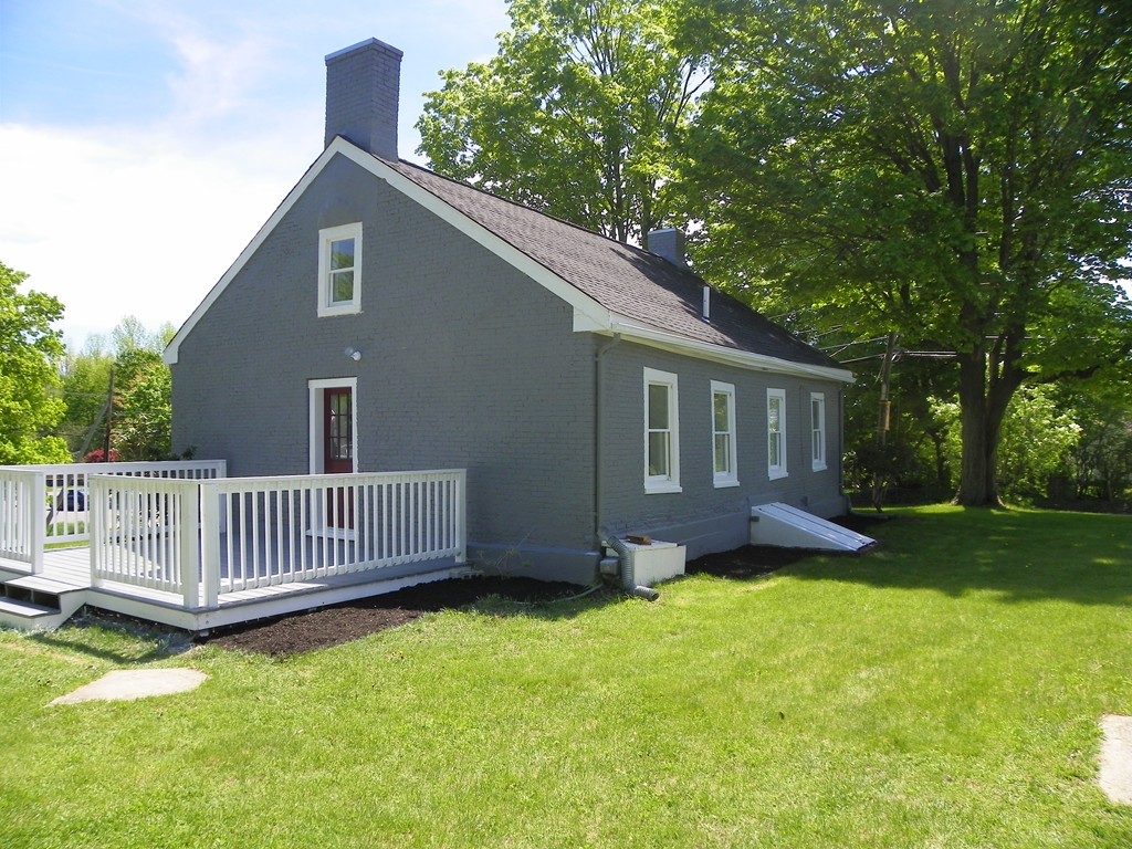 4 Gardner Road Hubbardston, MA 01452 - Photo 3 of 22 a view of a house with a yard and deck