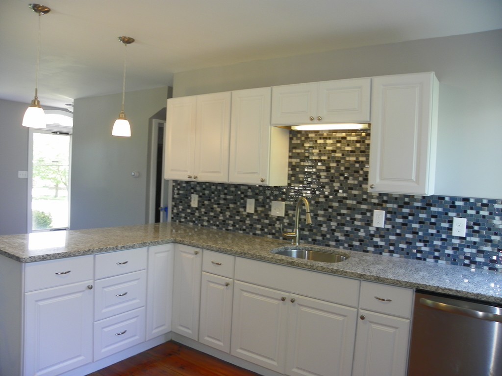 4 Gardner Road Hubbardston, MA 01452 - Photo 4 of 22 a bathroom with a granite countertop sink a toilet and mirror