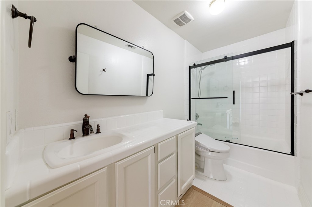 15601 Saddleback Road Canyon Country, CA 91387 - Photo 30 of 55 a bathroom with a sink toilet and shower