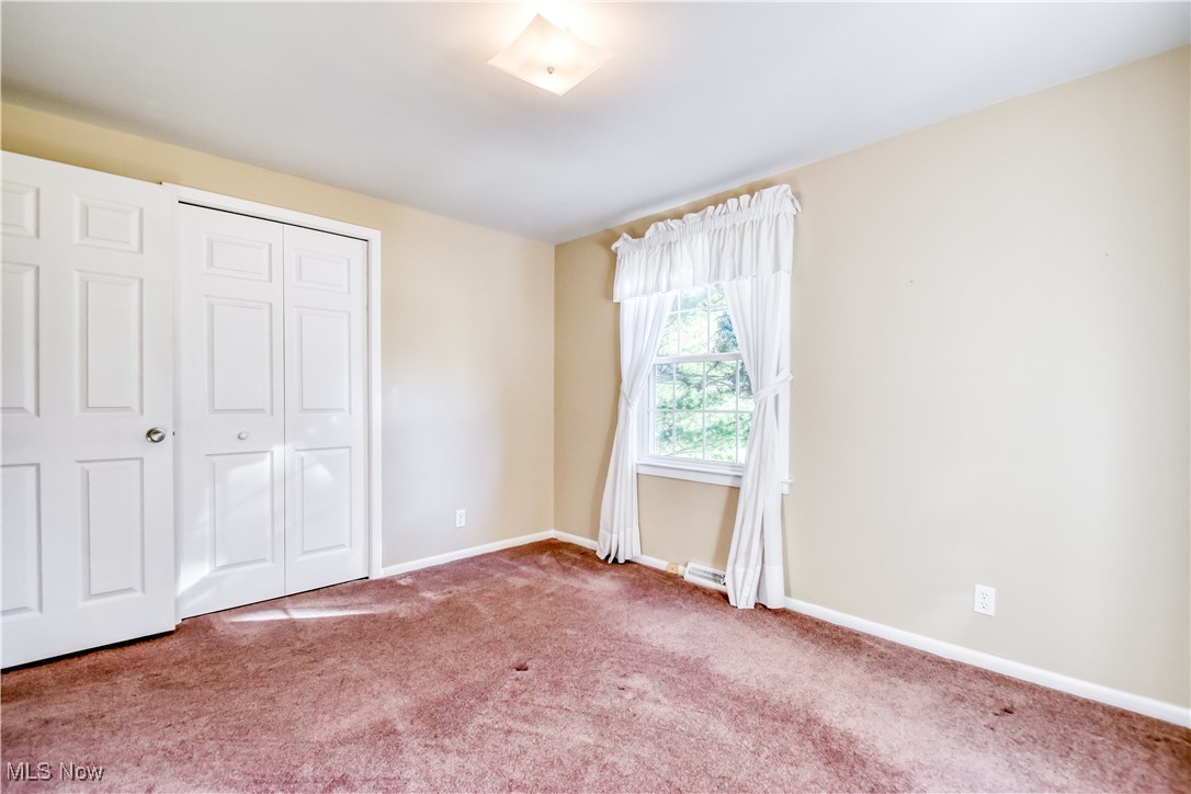 6145 Hemingway Road Cleveland, OH 44143 - Photo 27 of 50 Unfurnished bedroom with carpet floors and a closet