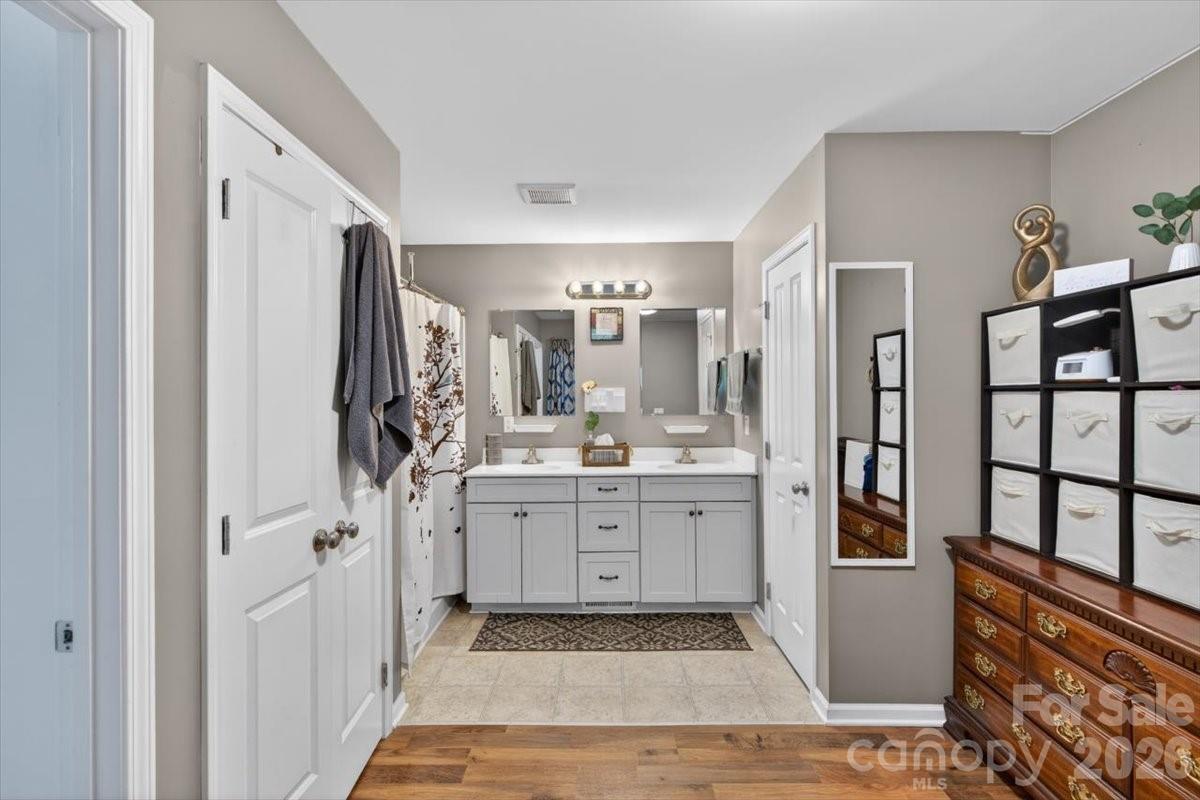 567 Godbey Road Mocksville, NC 27028 - Photo 17 of 38 a bathroom with a sink and a mirror