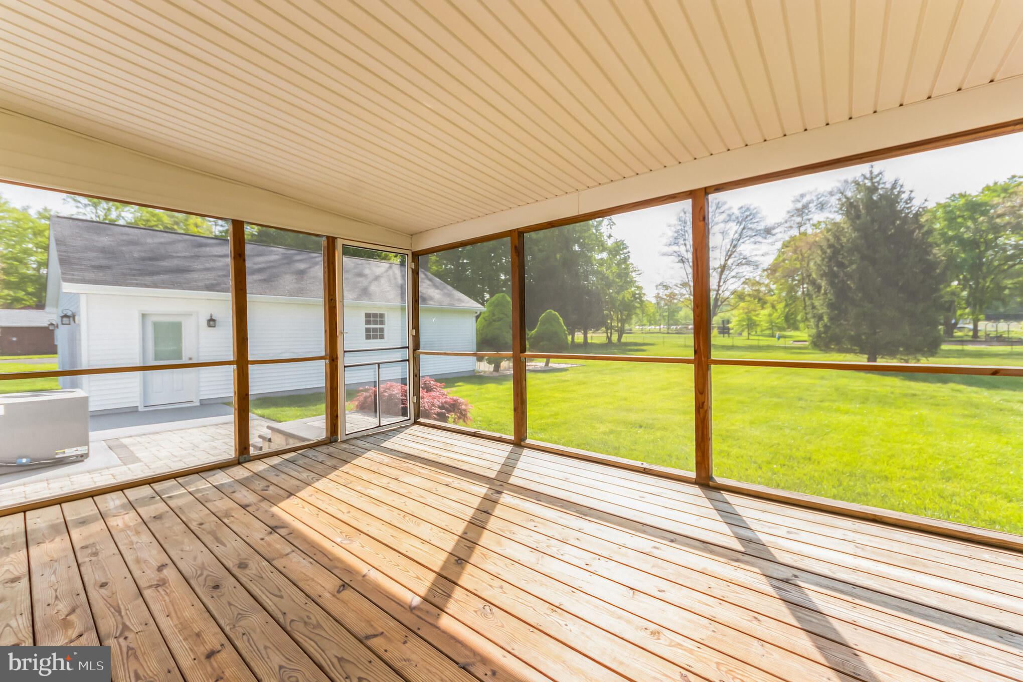 3037 Pine Road Huntingdon Valley, PA 19006 - Photo 16 of 31 Screened in porch overlooking yard