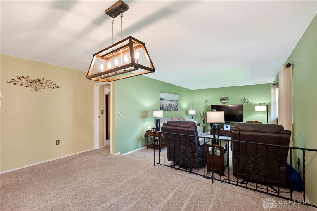 5907 Red Coach Road Dayton, OH 45429 - Photo 9 of 50 This inviting living space features an open layout, ideal for both relaxing and entertaining.