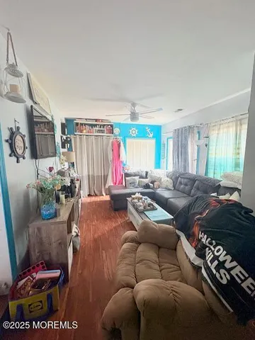 a bed room with furniture and a window