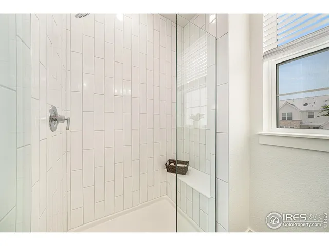 a picture of a bathroom with a shower curtain