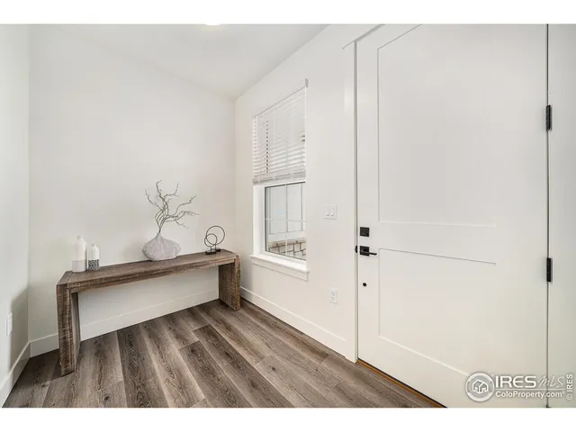 a view of workspace with wooden floor