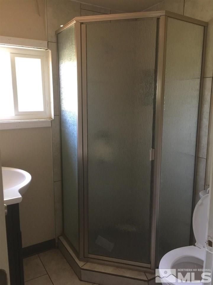 1333 Terrace Drive Reno, NV 89503 - Photo 17 of 21 a bathroom with a shower and a toilet