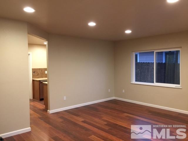 1333 Terrace Drive Reno, NV 89503 - Photo 6 of 21 a view of an empty room with wooden floor and a window