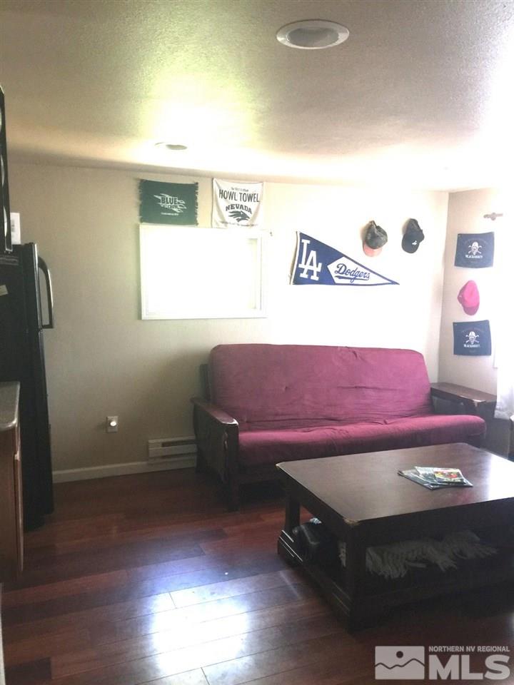 1333 Terrace Drive Reno, NV 89503 - Photo 9 of 21 a room with a bed and a night stand
