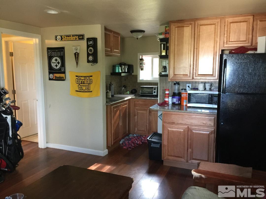 1333 Terrace Drive Reno, NV 89503 - Photo 10 of 21 a kitchen with stainless steel appliances a refrigerator and a stove