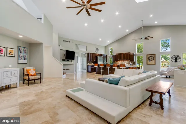 a bathroom with a sink mirror vanity and toilet