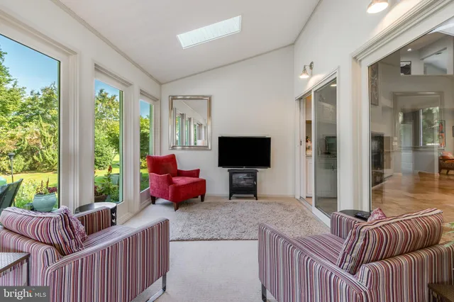 a living room with furniture and a couch