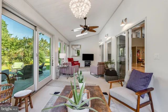a room with furniture and white walls
