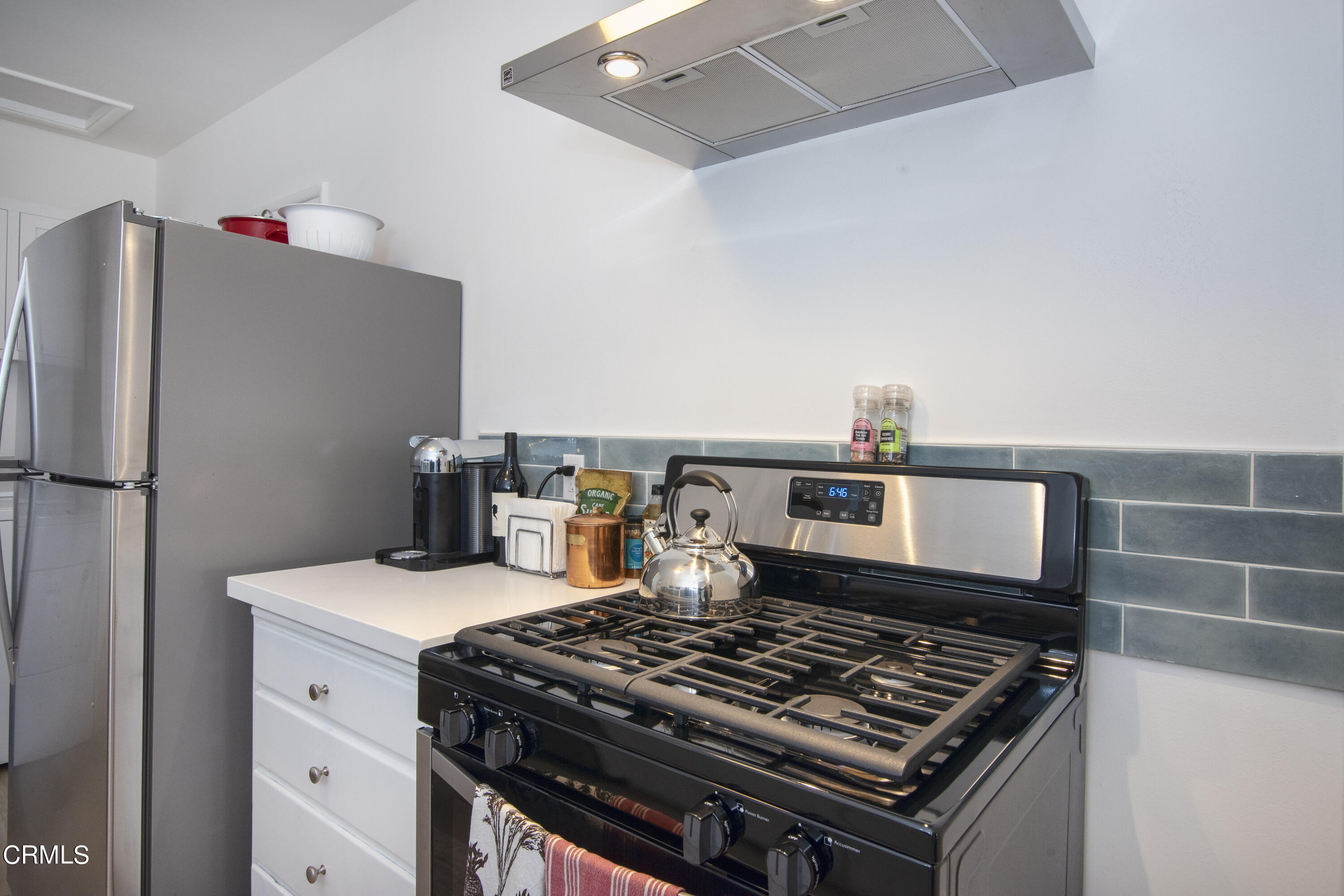 2935 Morningside Street Pasadena, CA 91107 - Photo 17 of 31 a stove top oven sitting inside of a kitchen