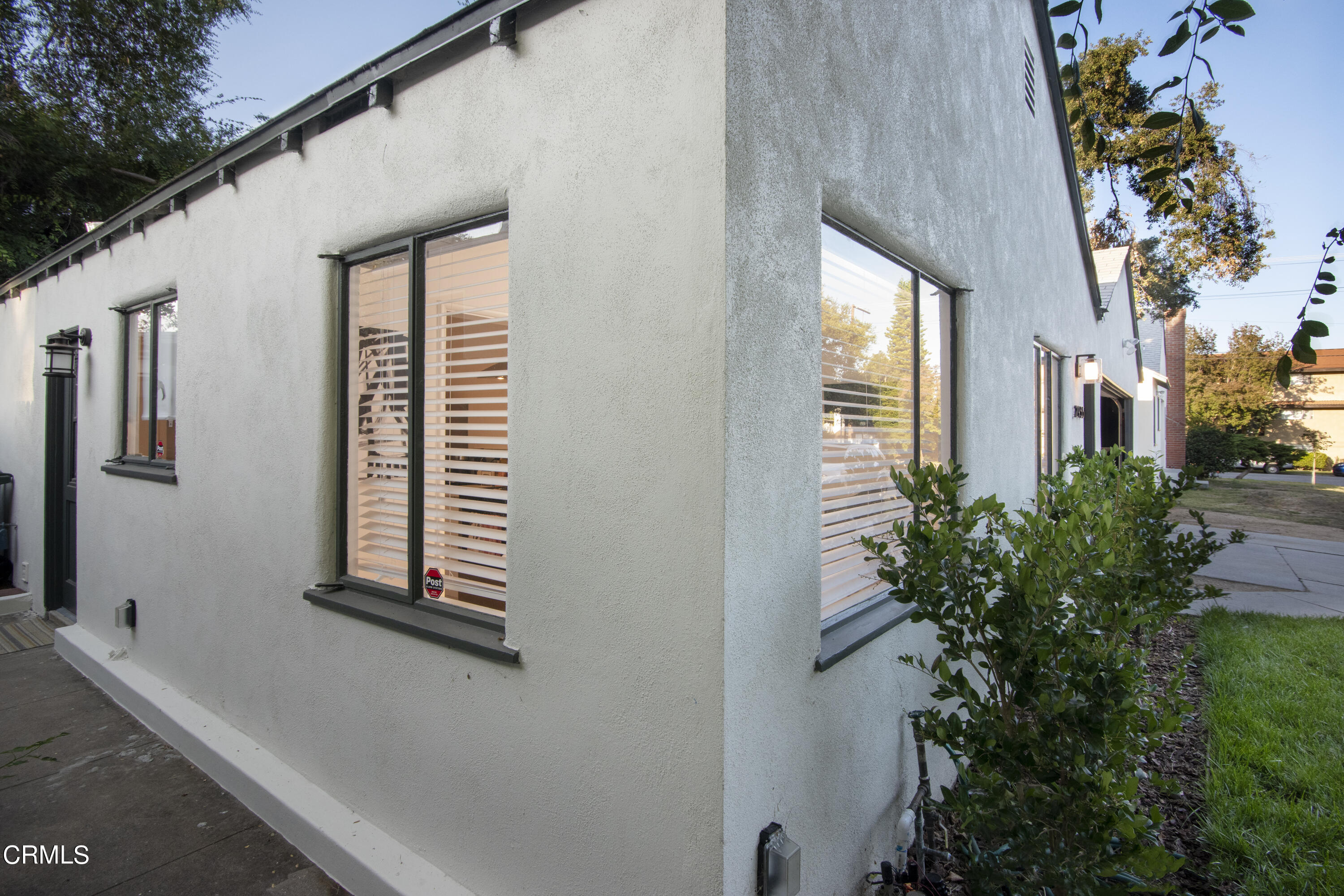2935 Morningside Street Pasadena, CA 91107 - Photo 25 of 31 a house with potted plants in front of it