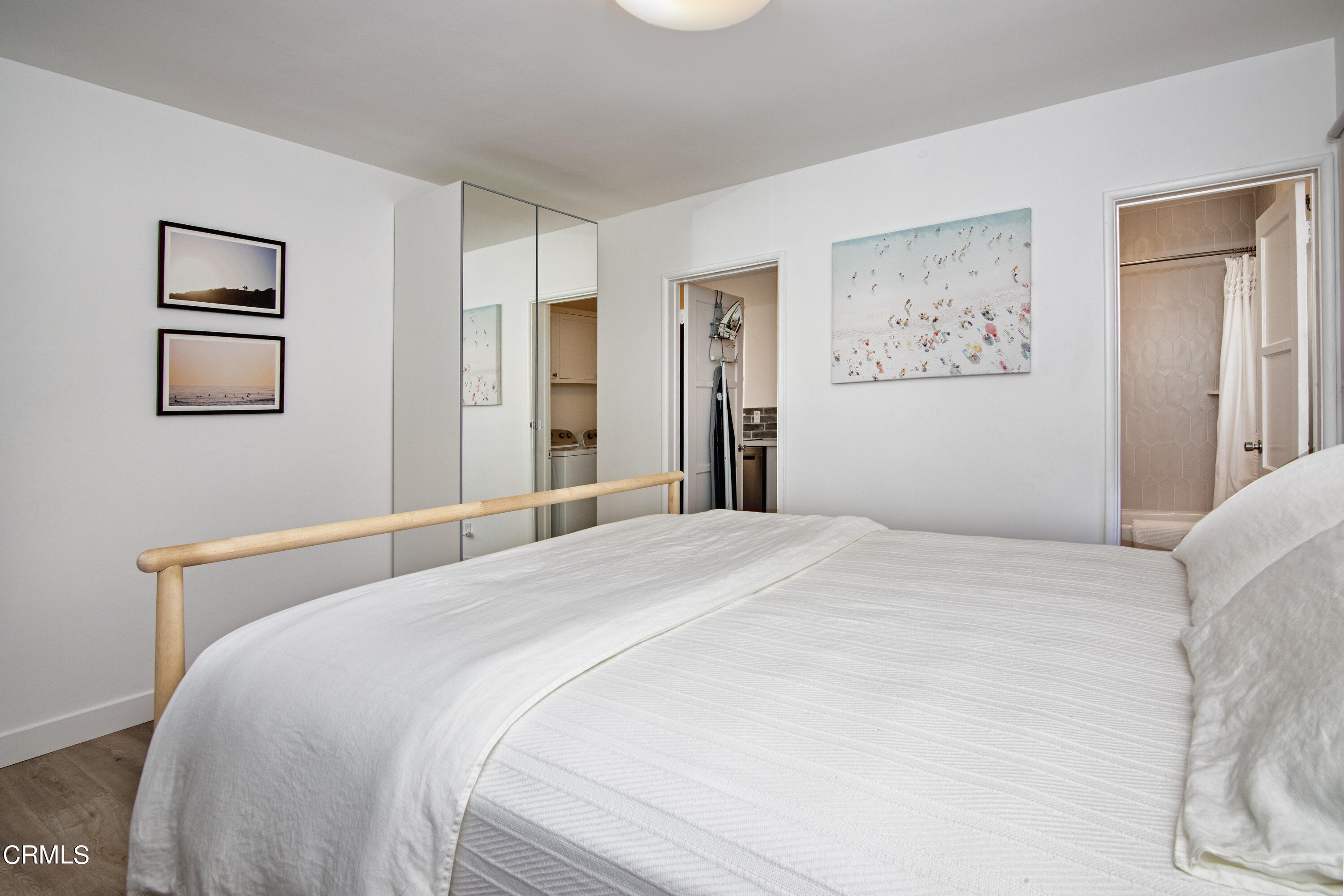 2935 Morningside Street Pasadena, CA 91107 - Photo 6 of 31 a bedroom with a large bed and painting on the wall