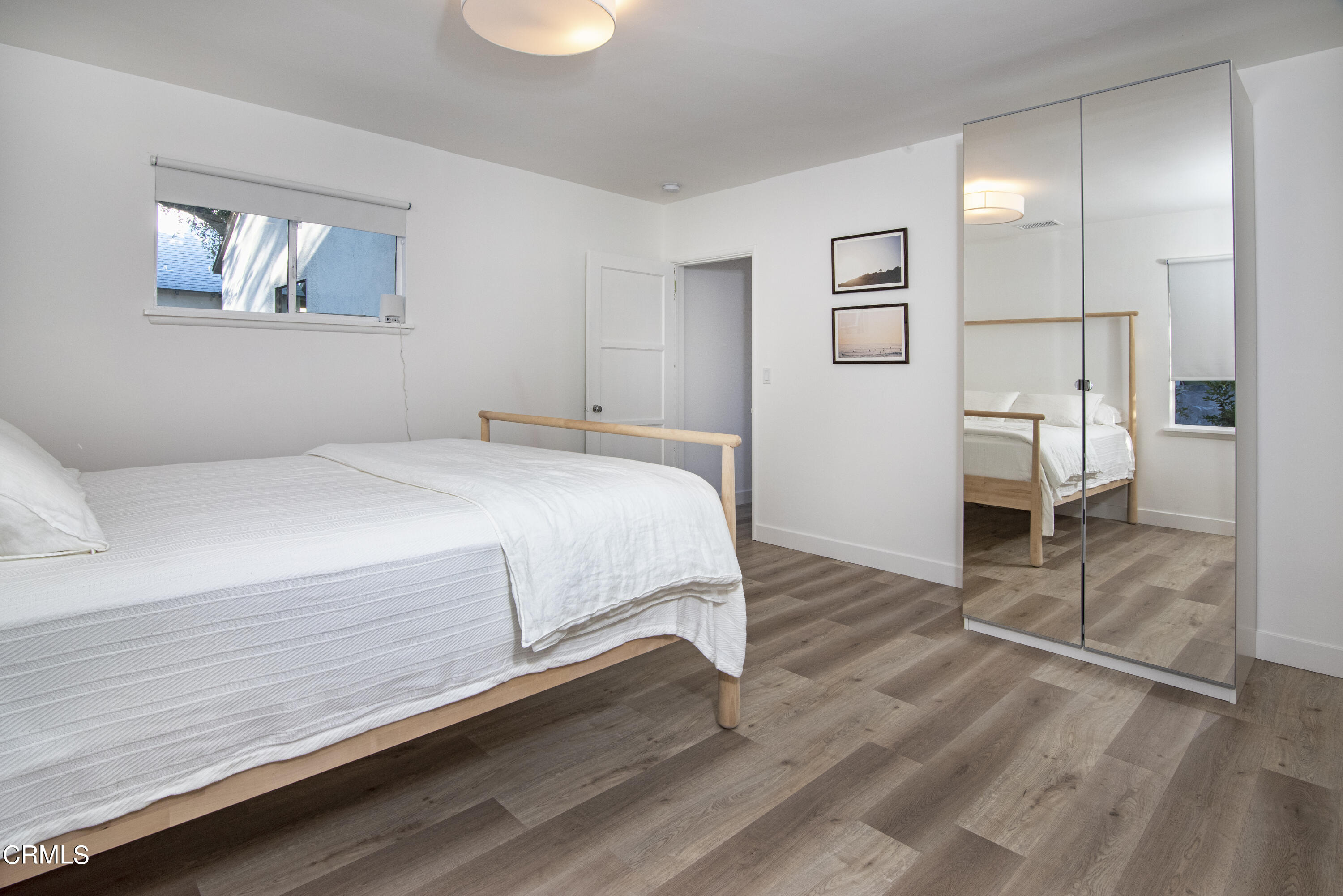 2935 Morningside Street Pasadena, CA 91107 - Photo 7 of 31 a bedroom with a bed and a view of living room