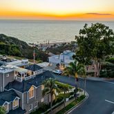 an aerial view of houses with yard