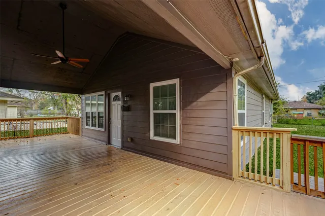 a view of outdoor space with wooden floor