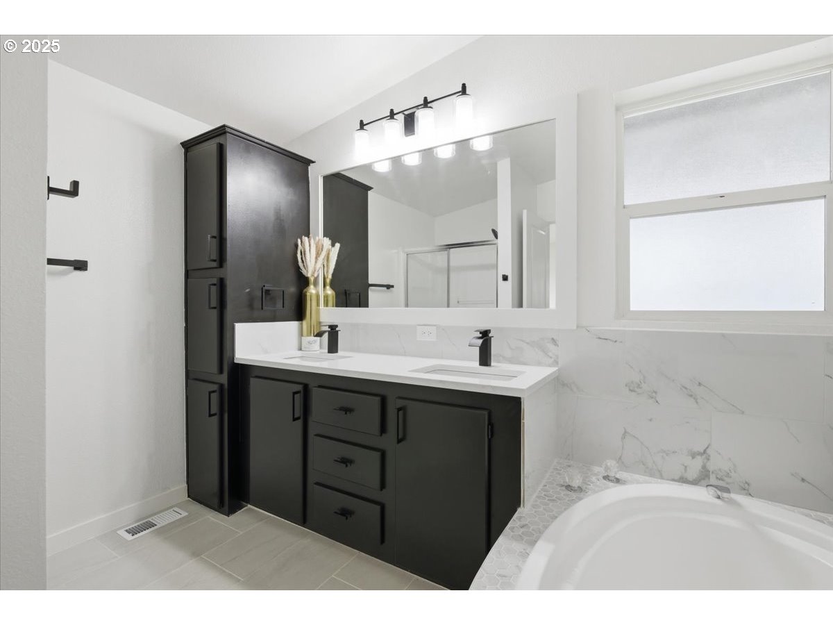 200 Market Street, Unit 255 Lebanon, OR 97355 - Photo 15 of 35 a bathroom with a sink vanity and mirror