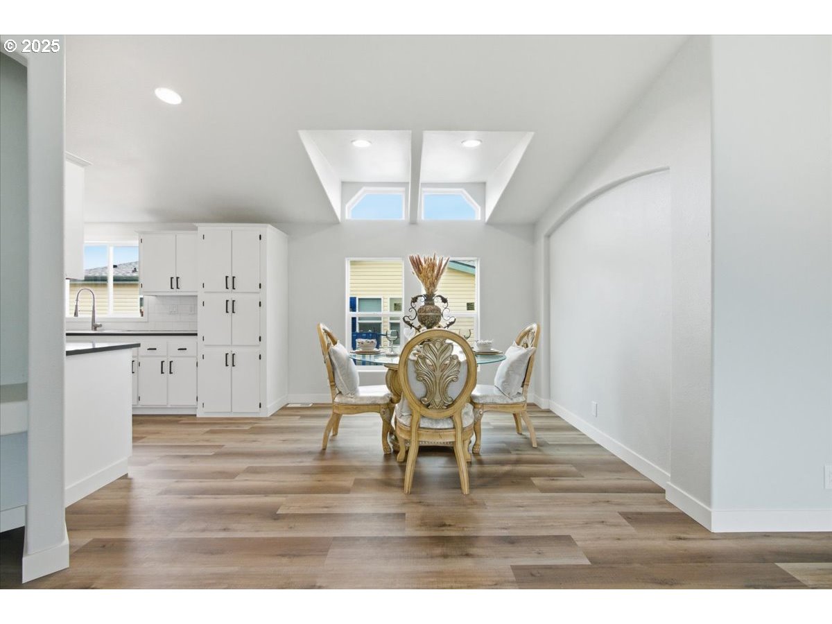 200 Market Street, Unit 255 Lebanon, OR 97355 - Photo 7 of 35 a view of a dining room with furniture and a window