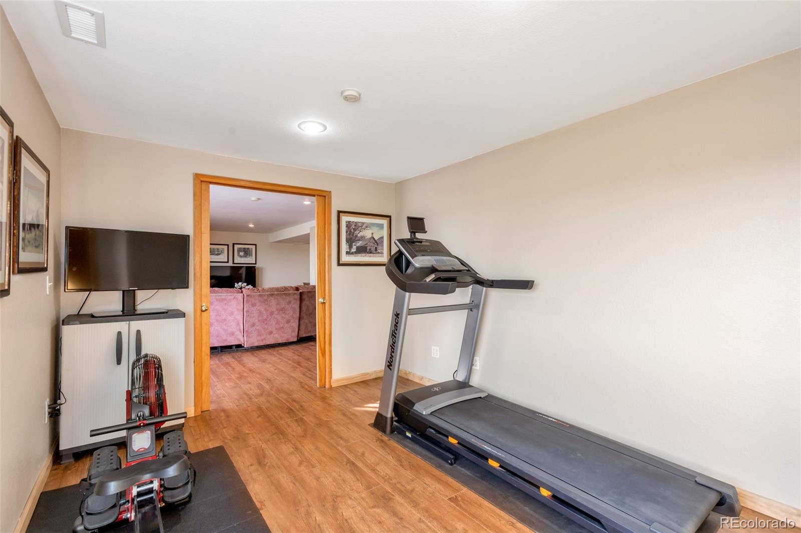 8678 Lariat Loop Elizabeth, CO 80107 - Photo 35 of 50 a view of a room with gym equipment