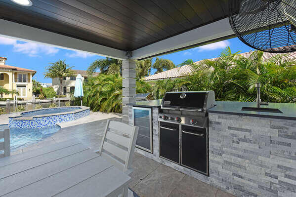 839 Enfield Street Boca Raton, FL 33487 - Photo 28 of 36 a view of an outdoor kitchen