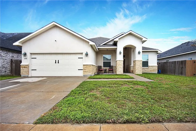 a view of house with garden