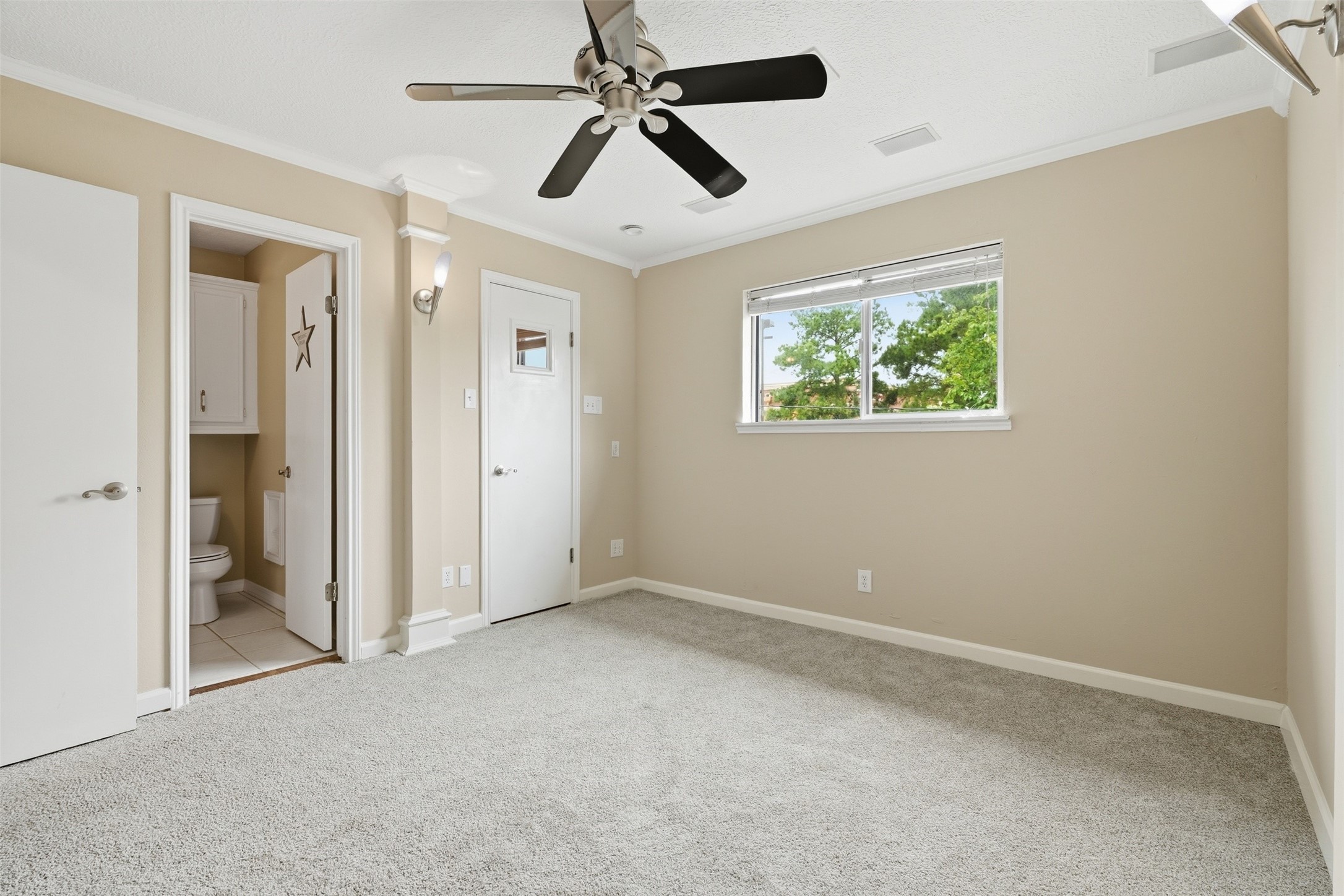8310 Mentmore Drive Spring, TX 77379 - Photo 39 of 47 Bright and spacious secondary bedroom offers flexibility for family, guests, or a home office.