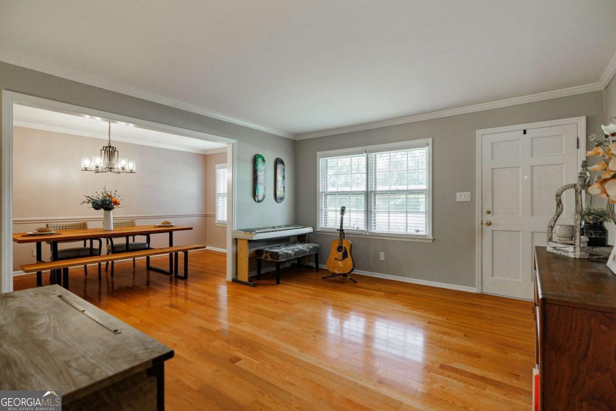 110 South Homewood Drive Athens, GA 30606 - Photo 12 of 21 a living room with furniture and wooden floor