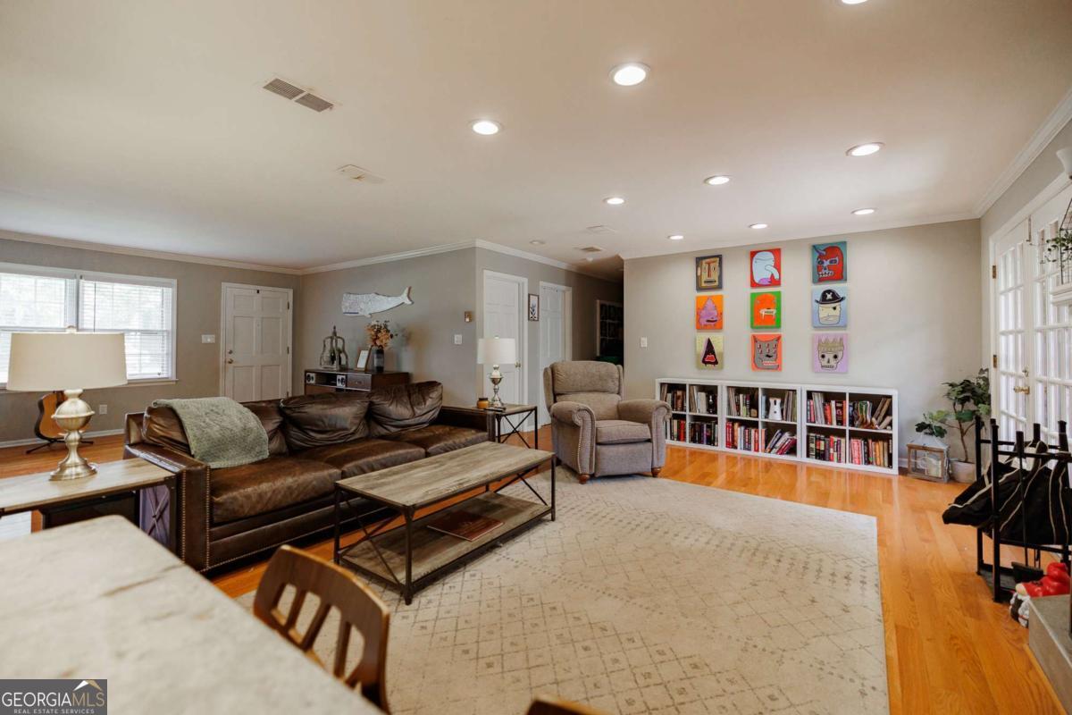 110 South Homewood Drive Athens, GA 30606 - Photo 6 of 21 a living room with furniture and a flat screen tv