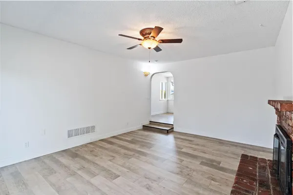 an empty room with a bathroom