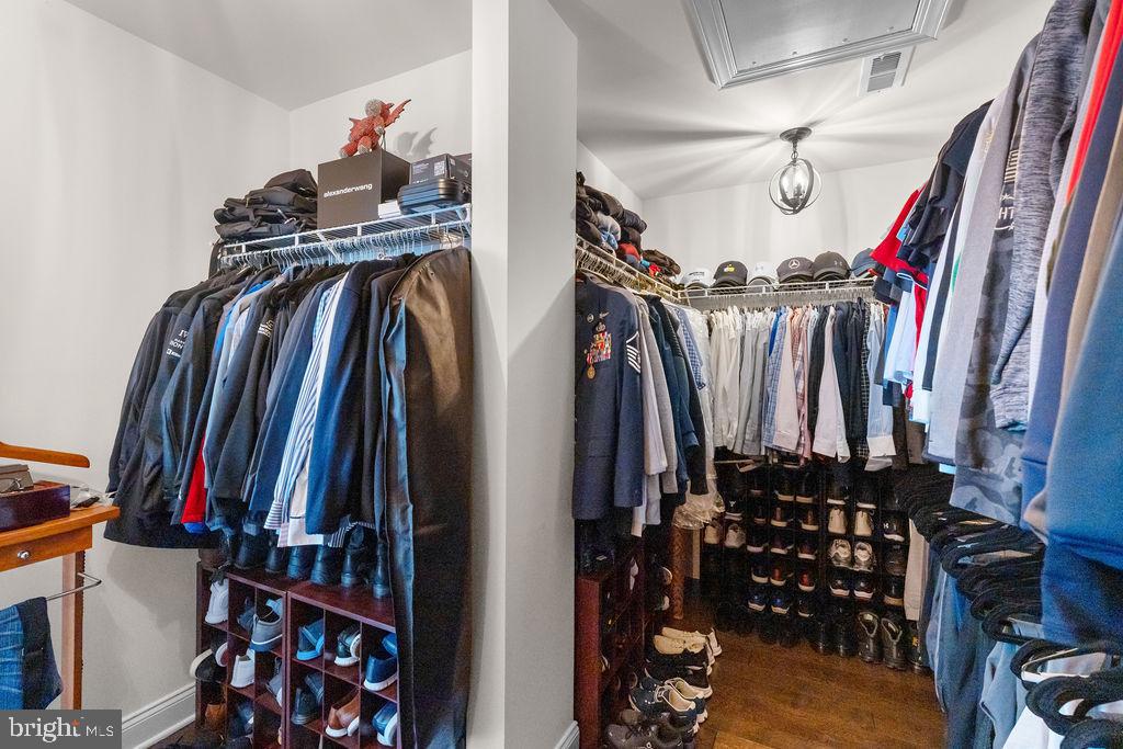 7608 Elmcrest Road Hanover, MD 21076 - Photo 20 of 41 a view of walk in closet with clothes and shoes