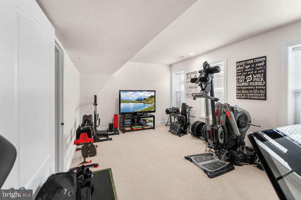 7608 Elmcrest Road Hanover, MD 21076 - Photo 30 of 41 a view of a room with gym equipment