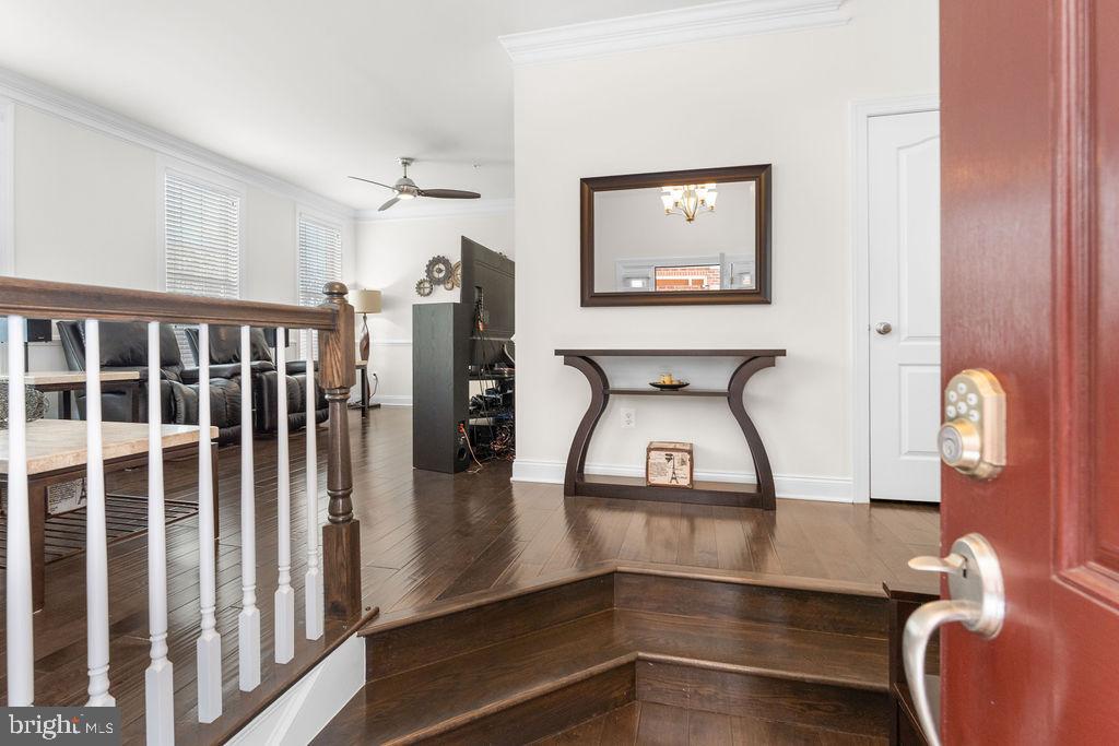 7608 Elmcrest Road Hanover, MD 21076 - Photo 3 of 41 a view of a hallway with seating area