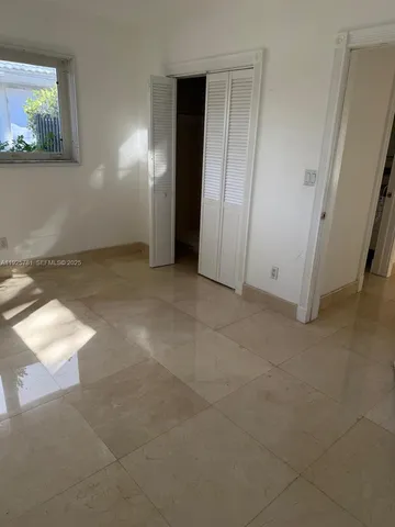 a view of a small space with a window