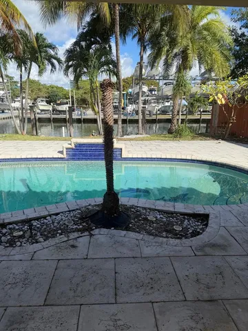 a view of a yard with a fountain