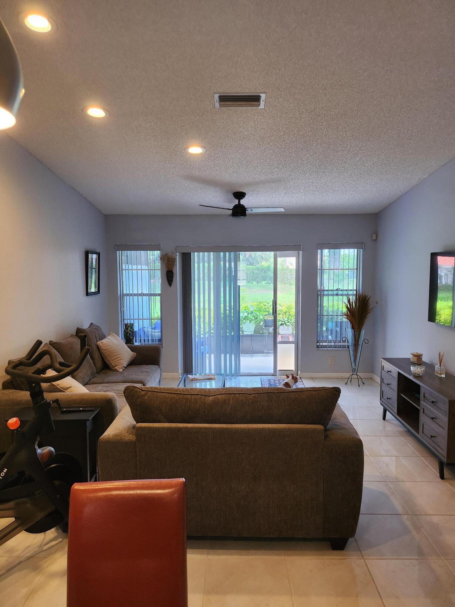 8951 Sunnywood Place Boca Raton, FL 33496 - Photo 16 of 47 8951 SUNNYWOOD PL Boca living room9
