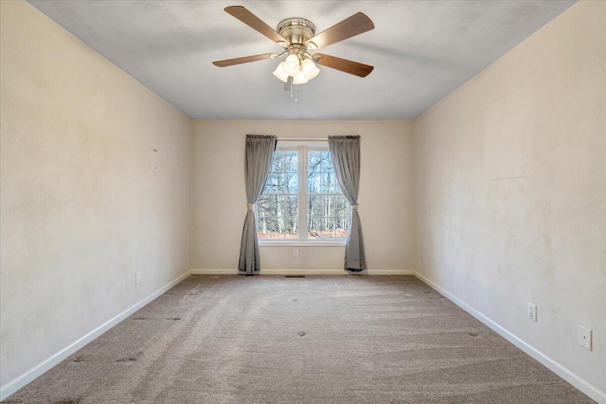 1093 Hales Ford Road Moneta, VA 24121 - Photo 14 of 45 wooden floor in an empty room with a window
