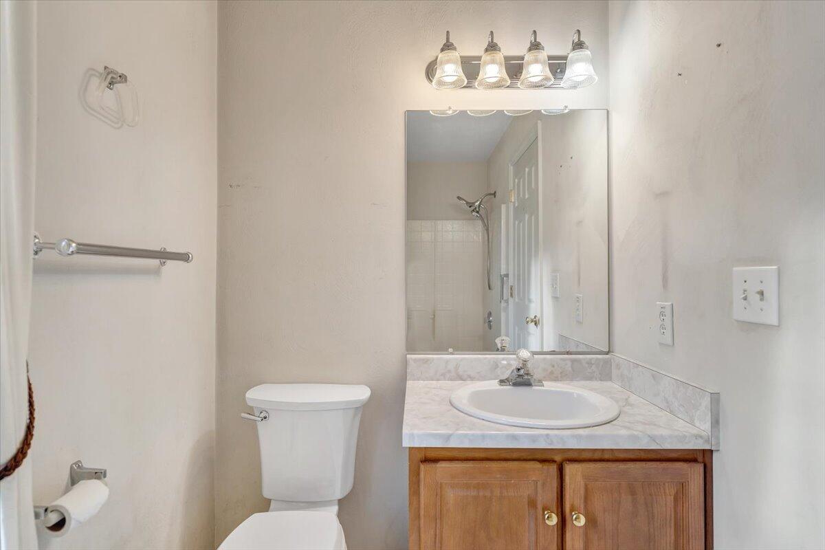 1093 Hales Ford Road Moneta, VA 24121 - Photo 17 of 45 a bathroom with a sink and a mirror