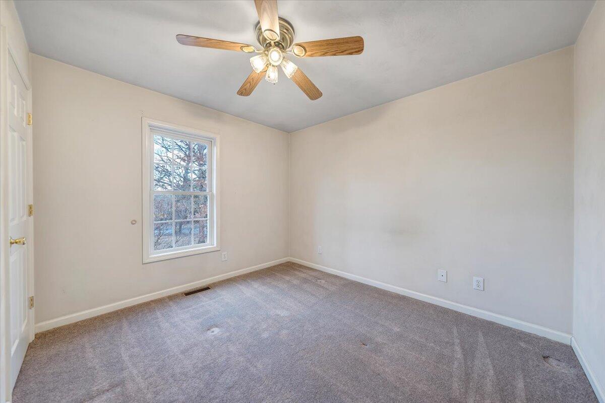 1093 Hales Ford Road Moneta, VA 24121 - Photo 20 of 45 an empty room with windows and fan