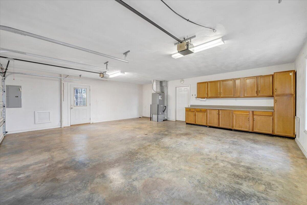 1093 Hales Ford Road Moneta, VA 24121 - Photo 34 of 45 a view of a livingroom with an empty space and a ceiling fan