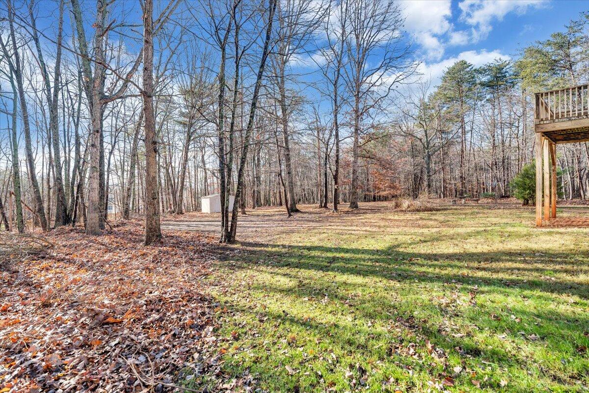 1093 Hales Ford Road Moneta, VA 24121 - Photo 39 of 45 a swimming pool with outdoor seating and yard
