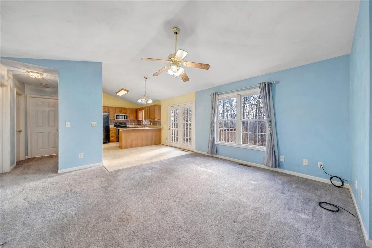 1093 Hales Ford Road Moneta, VA 24121 - Photo 4 of 45 a view of an empty room with a window